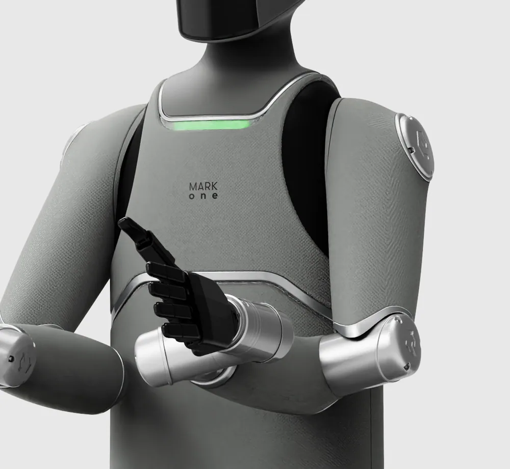 MARK One standing with its hands together